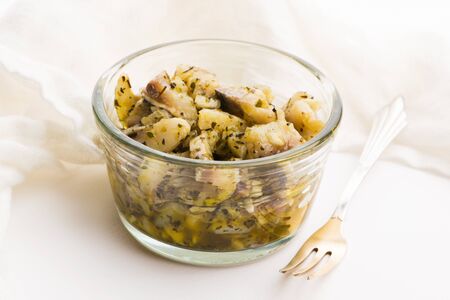 Herring salad with garlic, herbs and olive oilの写真素材