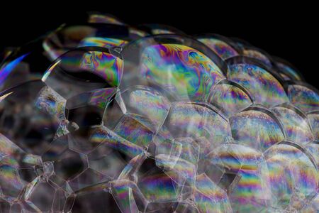 Soap foam on black background