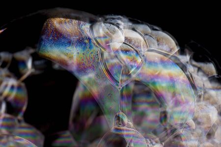Soap foam on black background