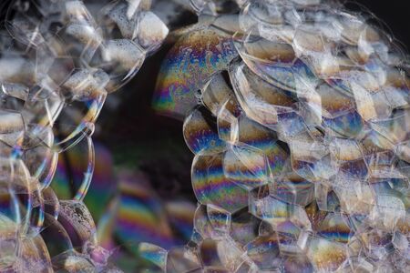 Soap foam on black background