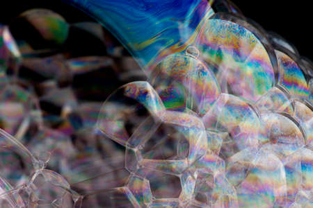 Soap foam on black background