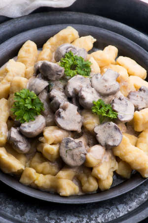 Gnocchi with a mushroom cream sauceの写真素材