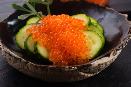 Appetizer. Cucumber with salmon trout caviarの写真素材