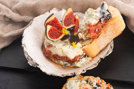 Appetizer - gorgonzola with mascarpone, figs, honey and herbsの写真素材