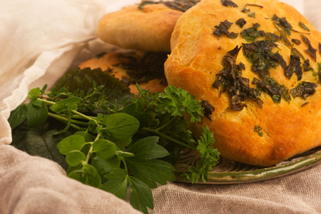 Manakish with Herbs on Handmade Ceramic Plateの写真素材