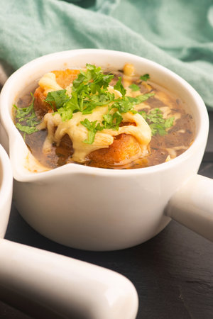 French Onion Soup with Baguette, Cheese and Parsley