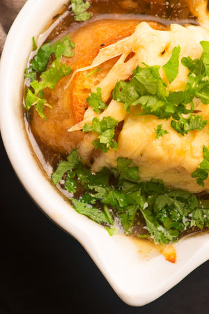 French Onion Soup with Baguette, Cheese and Parsley