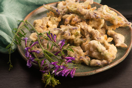 Alfalfa Flower Tempura on Handmade Ceramic Plateの写真素材