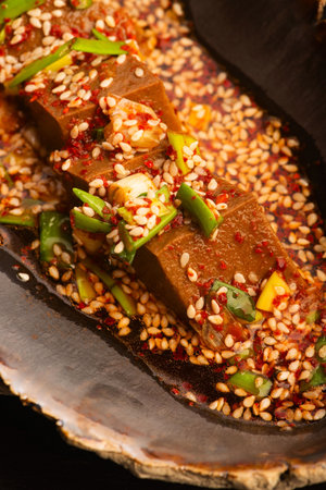 Korean Acorn Jelly with Sauce in Handmade Ceramic Bowlの写真素材