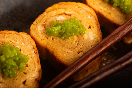 Japanese Tamagoyaki with Green Wasabi Caviar on Ceramic Stand