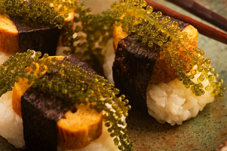 Tamagoyaki Sushi with Okinawan Sea Grapes on Ceramic Plate