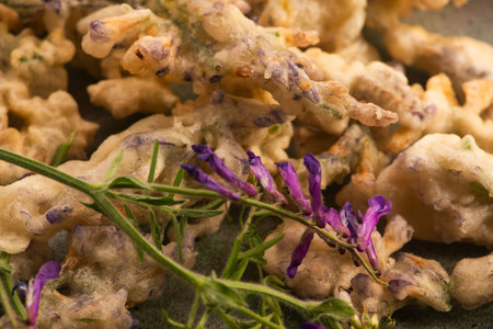 Alfalfa Flower Tempura on Handmade Ceramic Plateの写真素材