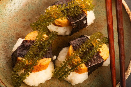Tamagoyaki Sushi with Okinawan Sea Grapes on Ceramic Plate