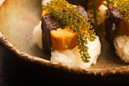 Tamagoyaki Sushi with Okinawan Sea Grapes on Ceramic Plate