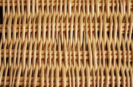 Background texture of the yellow wit basketworkの写真素材