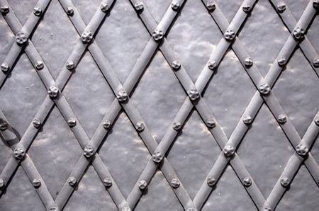 rusty iron texture background with diamond patternの写真素材