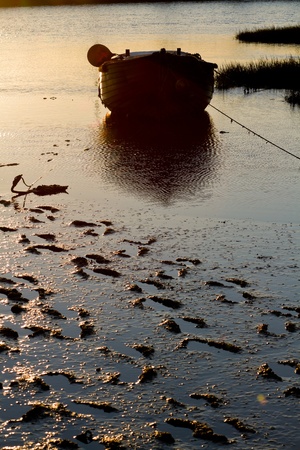 An old wooden fishing boat takes the morning off.Kent UK.のeditorial素材