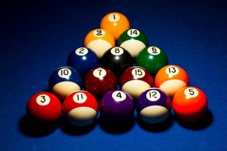 Correct 8ball break sequence. Dramatic lighting on blue felt.