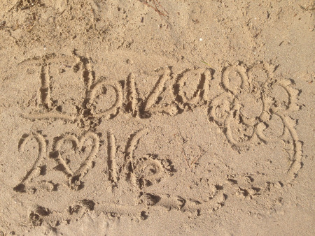 Writing in the sand of an Ibiza's beachの写真素材