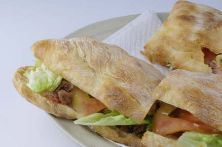 close up of  bread with roast beef and saladの写真素材