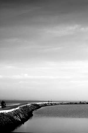 Walk by the riverの写真素材