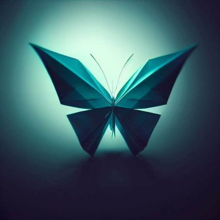 Paper butterfly on a blue background. Shallow depth of field.の素材