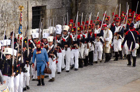 Almeida, Portugal - 08/26/2017: Reenactment of siege of Almeida during Napoleonic Peninsular War - french soldiers marchingのeditorial素材