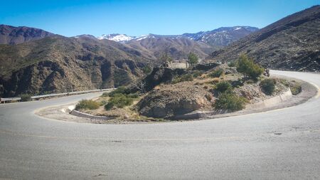 Empty road in curve in Atlas mountains in Moroccoの写真素材