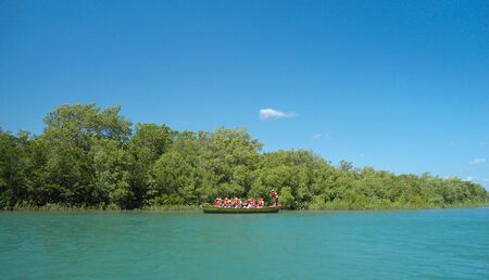 Group of tourist in a boat in Camocim, Ceara, Brazilの写真素材