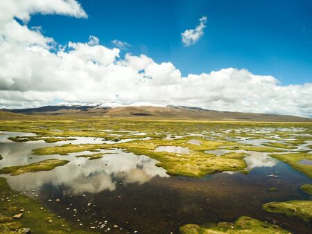 View of Mirador de los Volcanes in Peru, near Arequipa. Reflection in the lake