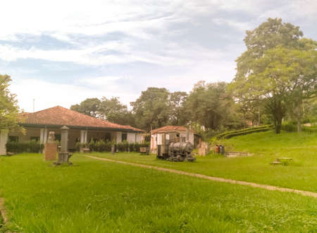 Old train locomotive in Floresta NAcional Fazenda Ipanema, Sao Paulo, Brazil. Traditional landmark, old houses and picnic areaの写真素材