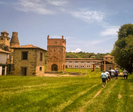 Ancient old blast furnaces made of bricks in the Floresta Nacional Fazenda Ipanema, Sao Paulo, Brazil. Group of tourists visiting the landmark, old factory of guns in Brazilのeditorial素材