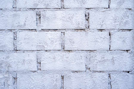 Brickwork background. House or site under construction. Building brick wall structure. White brick...