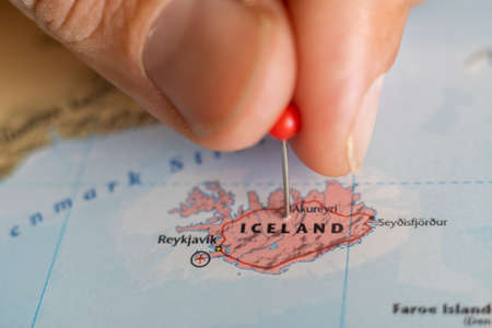 Iceland pin on a world map. Iceland travel destination planning pinnedのeditorial素材