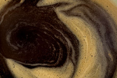 Coffee texture background. Strong espresso extreme dark coffee brown froth closeupの写真素材