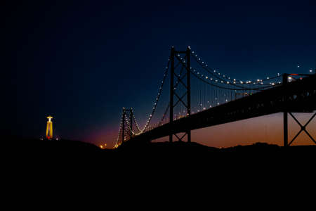 Night View over the 25th of April bridgeの写真素材