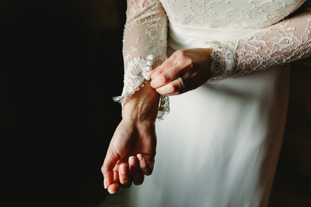 Hands and wedding dressの写真素材