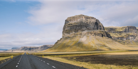 Icelandic lonely road in wild territory with no one in sightの写真素材