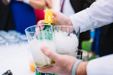 Drinks during a wedding in glass cups with ice