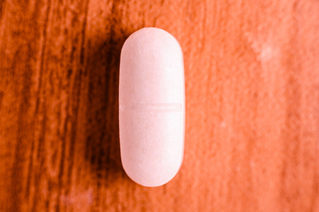 magnesium pill to improve the health of the bones of the body and cure diseases.の写真素材