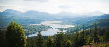 Blue lake among tranquil woods to relax with calm on vacation