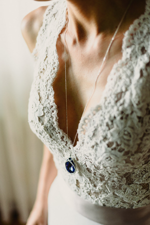 Detail of a white and elegant wedding dress.の写真素材