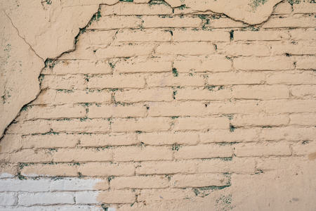 texture of battered, dirty and old brick wall and floor of various colorsの写真素材