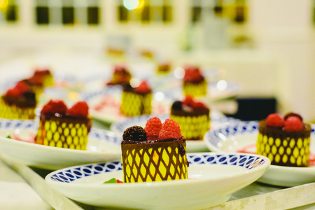 Frozen desserts prepared to be served to diners at an event