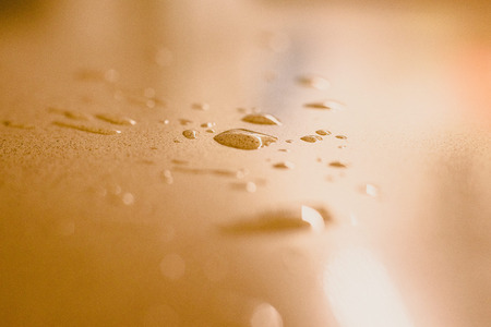 Drops of water and splashes in a kitchenの写真素材