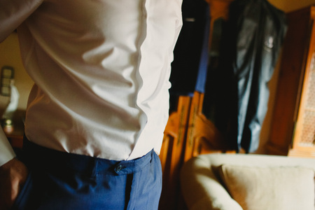 Groom getting ready to get married dressingの写真素材