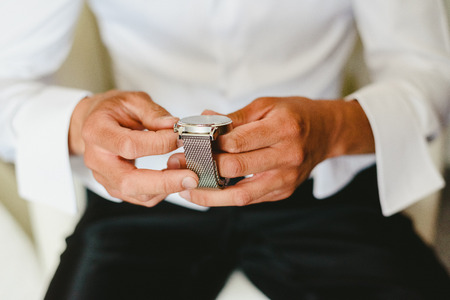 Men dressing on their wedding day