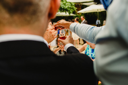 Having a drink at a weddingの写真素材