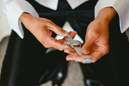 Men dressing on their wedding dayの写真素材