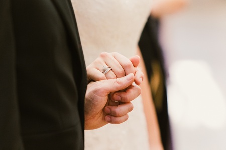 Silver and gold wedding ringsの写真素材